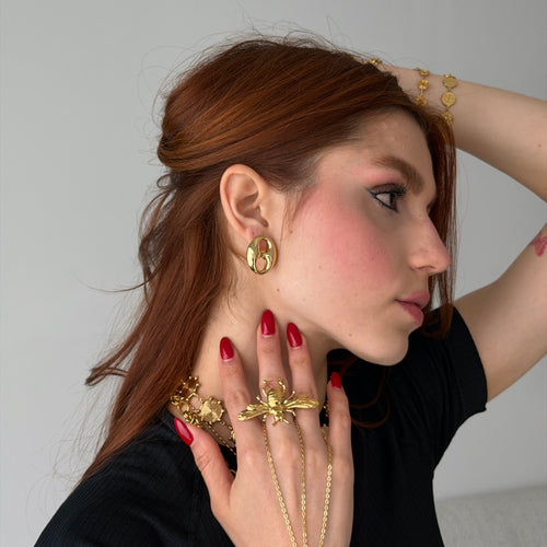 CHUNKY BUCKLE STUDS