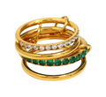 CP STATEMENT gold stainless steel spinning ring featuring emerald green and clear crystal accents