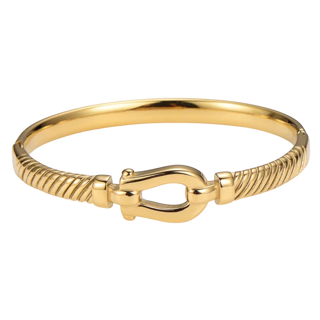 CP STATEMENT gold plated stainless steel belt bangle with a textured twisted design and non-tarnish PVD finish